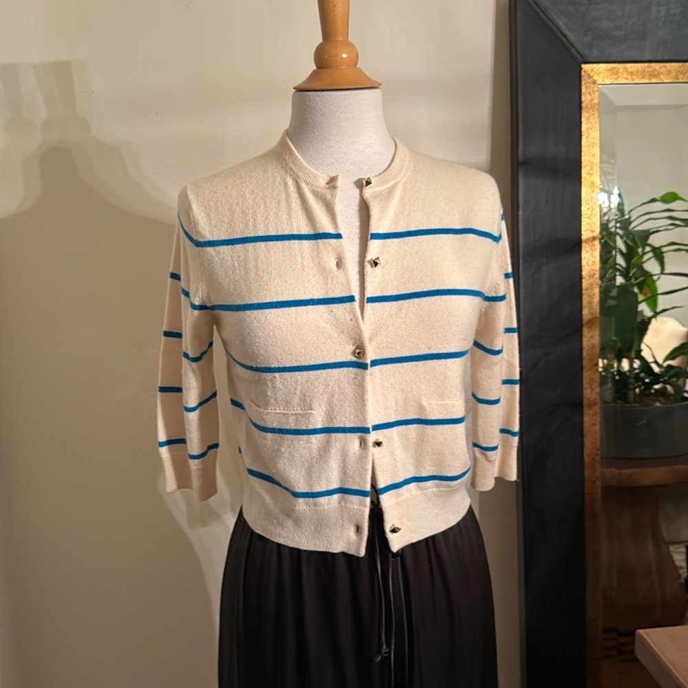 Seaton Cashmere 3/4 sleeve cardigan with gold diamond cut buttons.